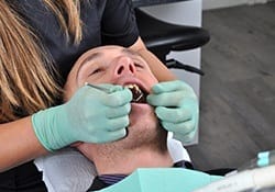 Man receiving dental care