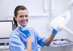 Dental receptionist smiles